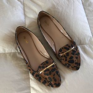 Cheeta pattern slip on shoes